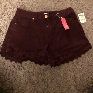 Two pairs of high waisted denim shorts